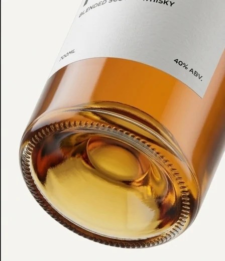 Heavy glass base of the No Drama bottle