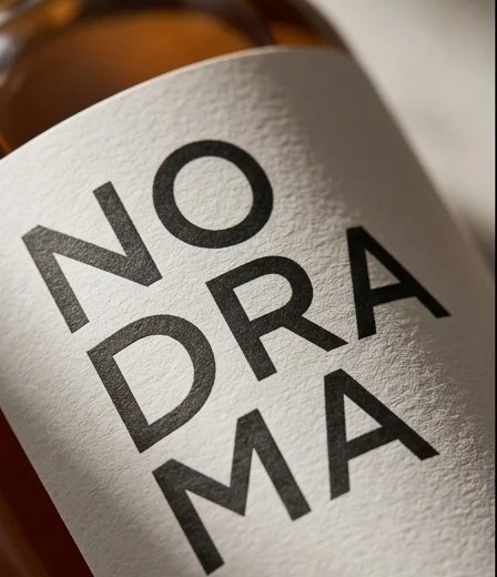 Close detail of the No Drama label